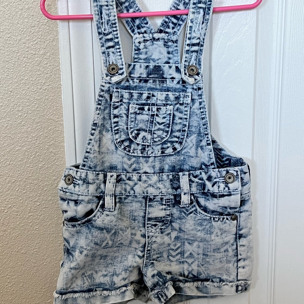 Squeeze brand overalls. Acid washed.  Excellent condition. Little girls size 4.